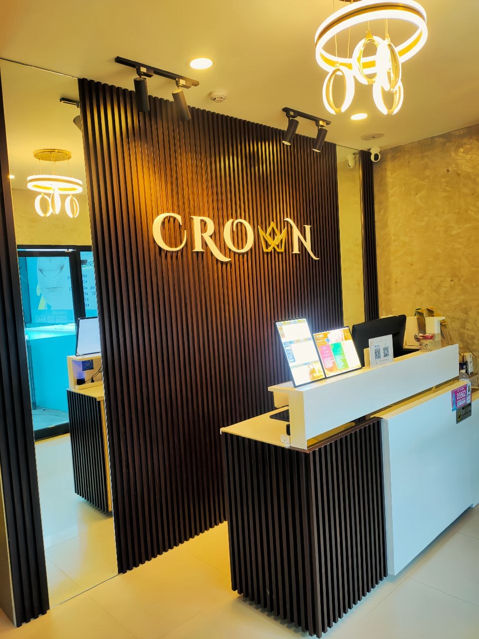 Crown Head Spa gold signage at reception