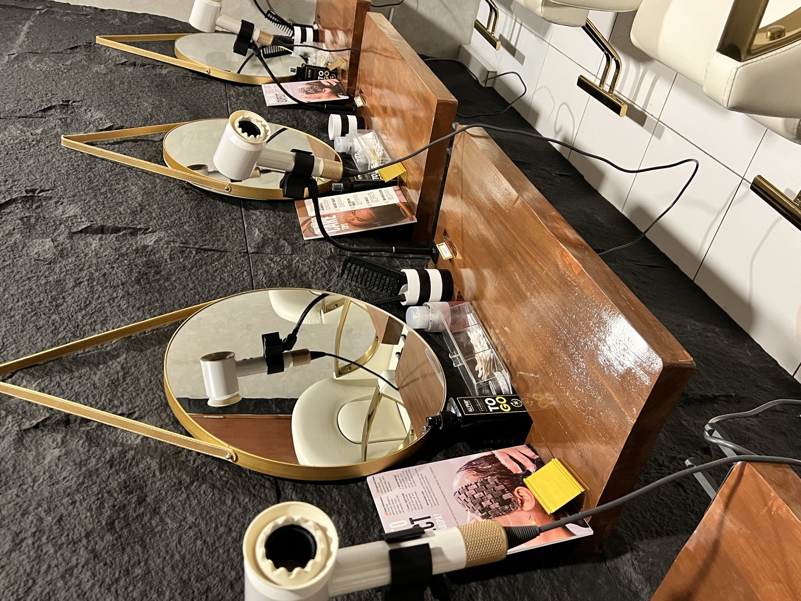 Styling row with gold teardrop mirrors