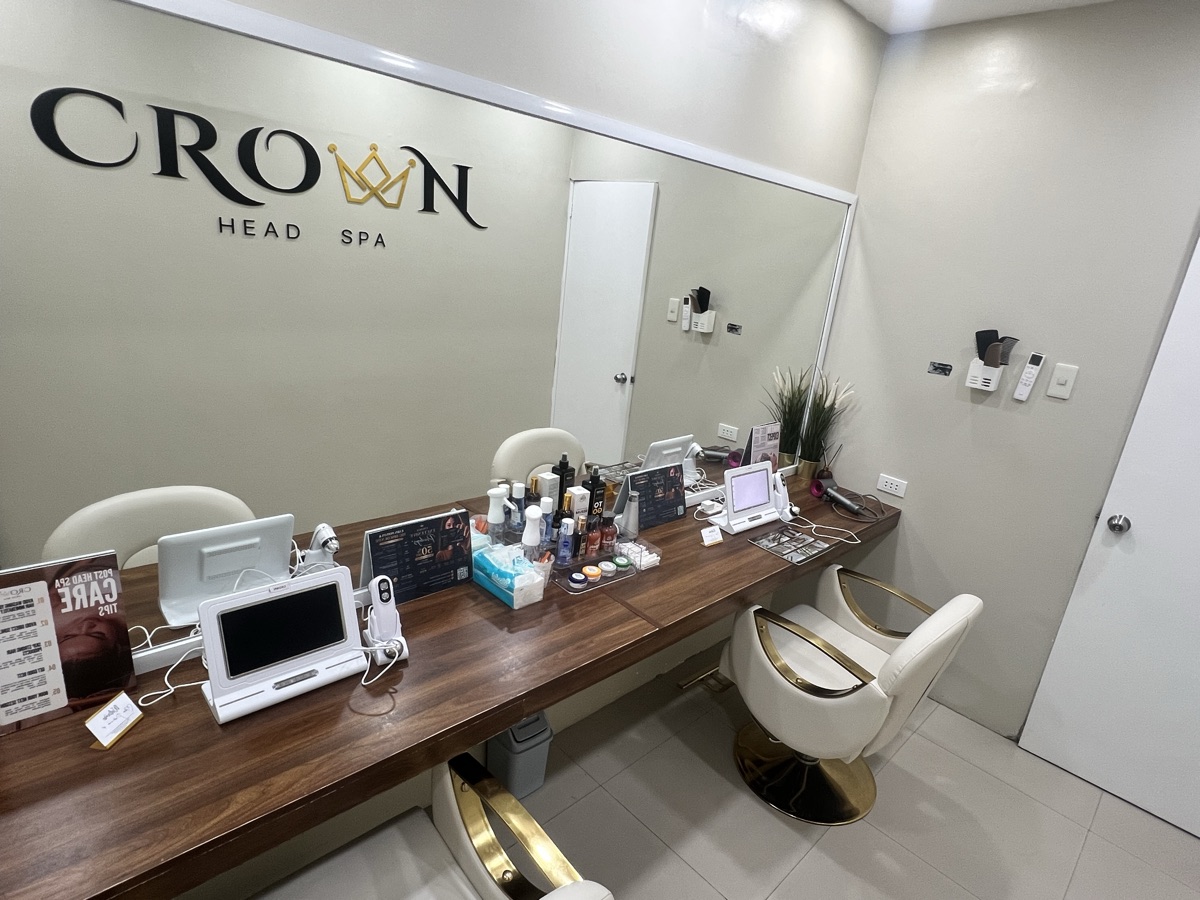 Styling station with Crown Head Spa signage