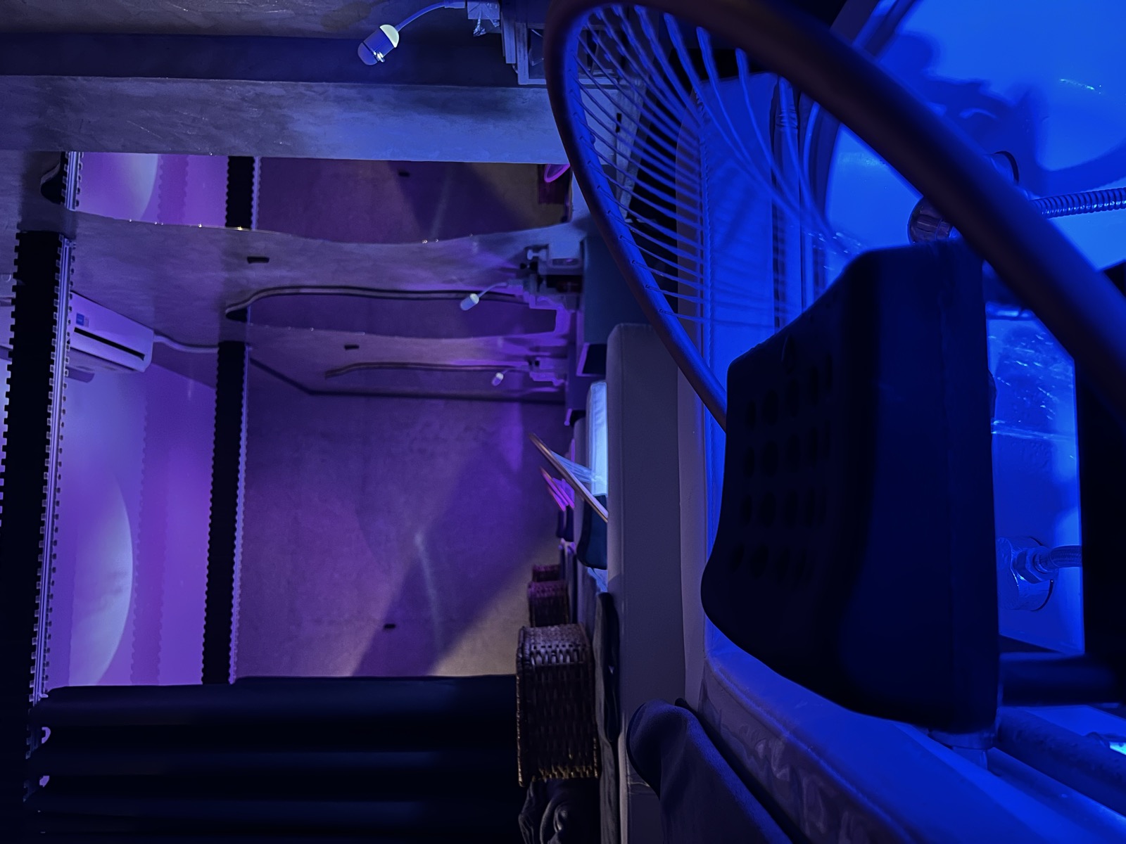 Treatment cubicle with purple mood lighting