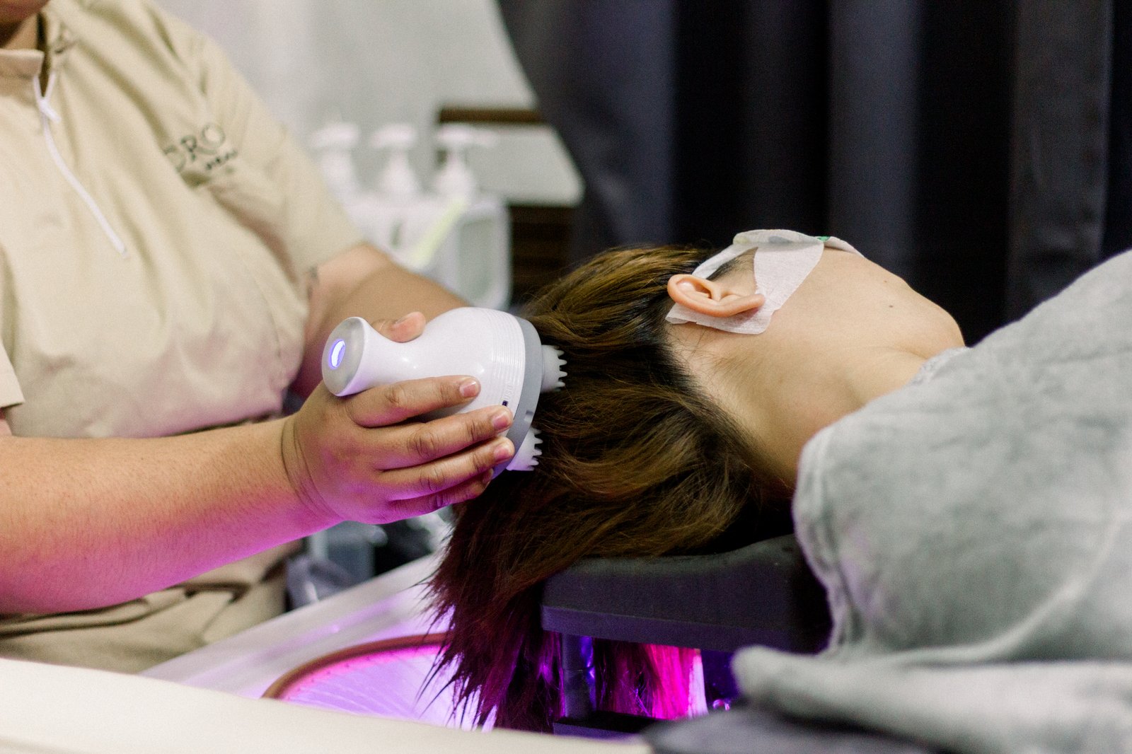 Scalp massage device in use