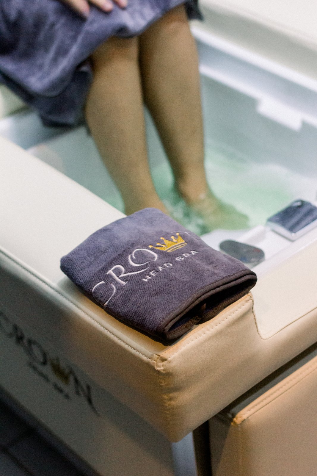 Crown Head Spa towel beside the foot soak